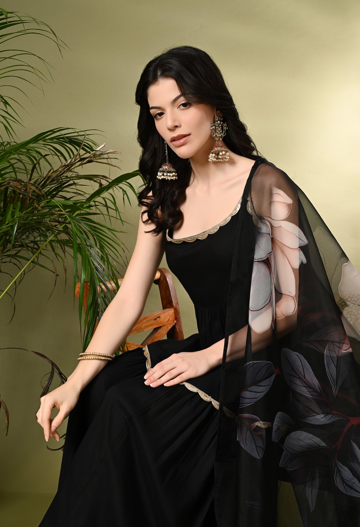 Sophisticated Glamour: Women's Black Viscose Rayon Peplum Kurta Sharara Set with Floral Organza Dupatta