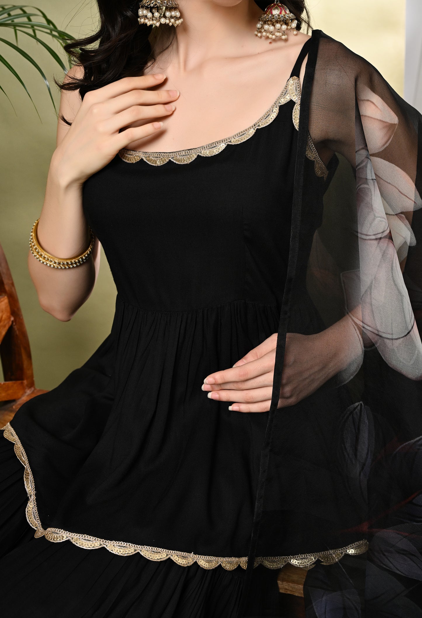 Sophisticated Glamour: Women's Black Viscose Rayon Peplum Kurta Sharara Set with Floral Organza Dupatta